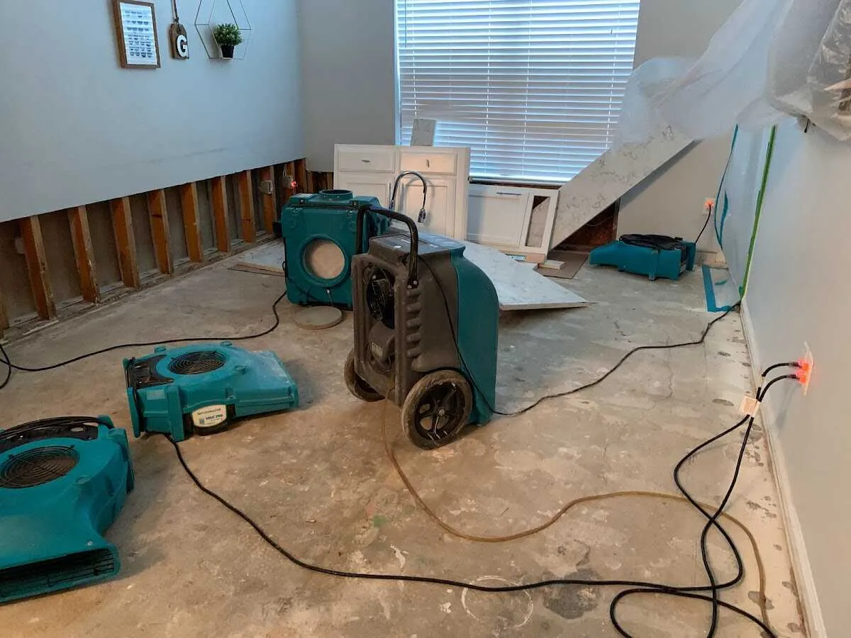 Dehumidifier in flood-cut room for Water Damage Restoration in Dunedin